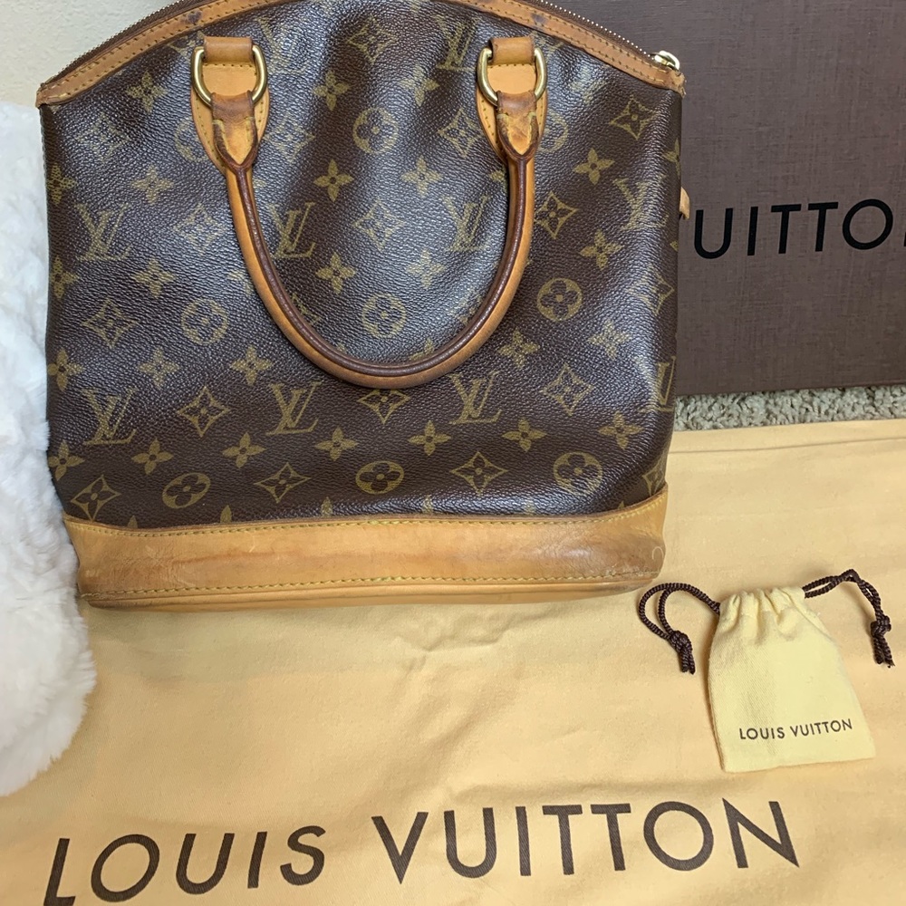 Authentic Louie Vuitton Lockit handbag